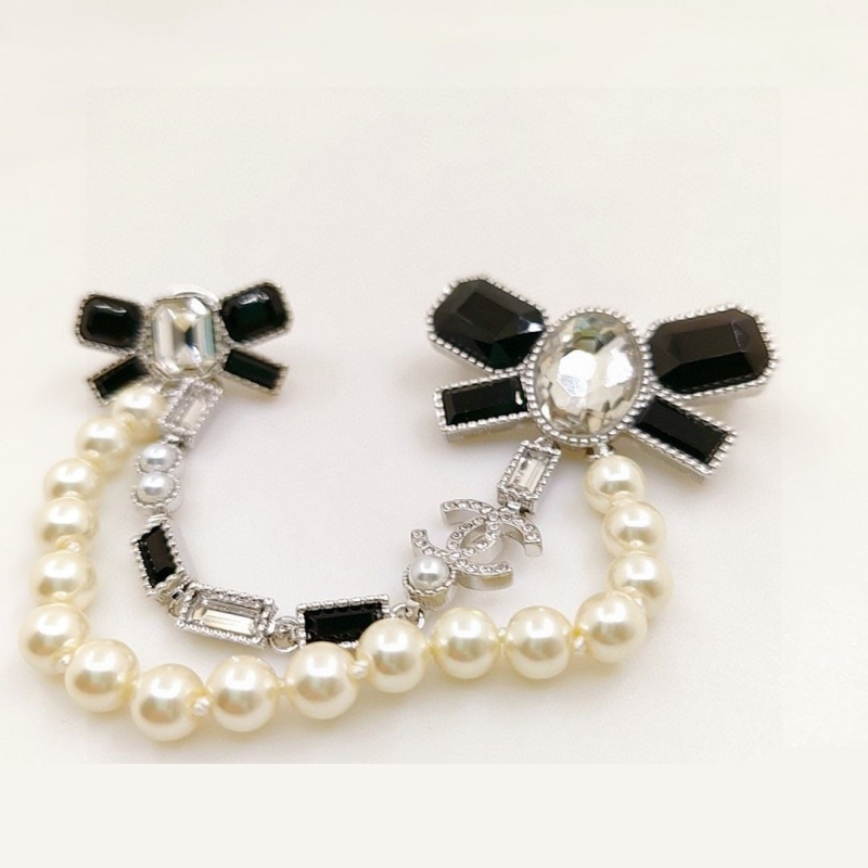 Ch*el brooches